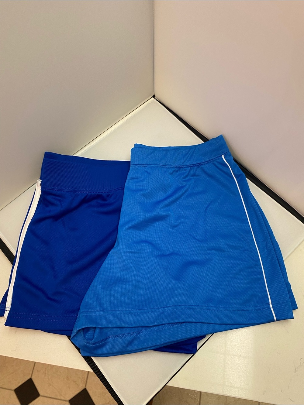 Two pairs of Athletic Works Dual Blue Athletic Shorts size medium